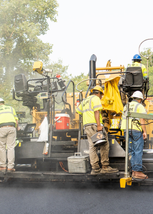 Fresh asphalt being paved and milled in Kentuckiana