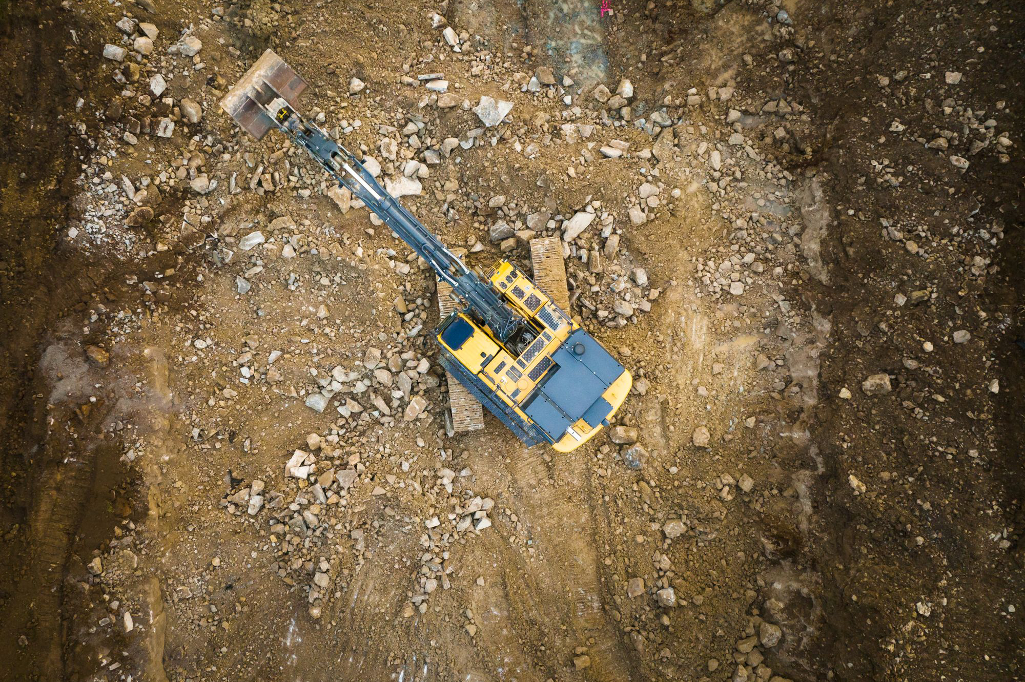 An aerial view of a crane on the site of an excavation in Kentuckiana